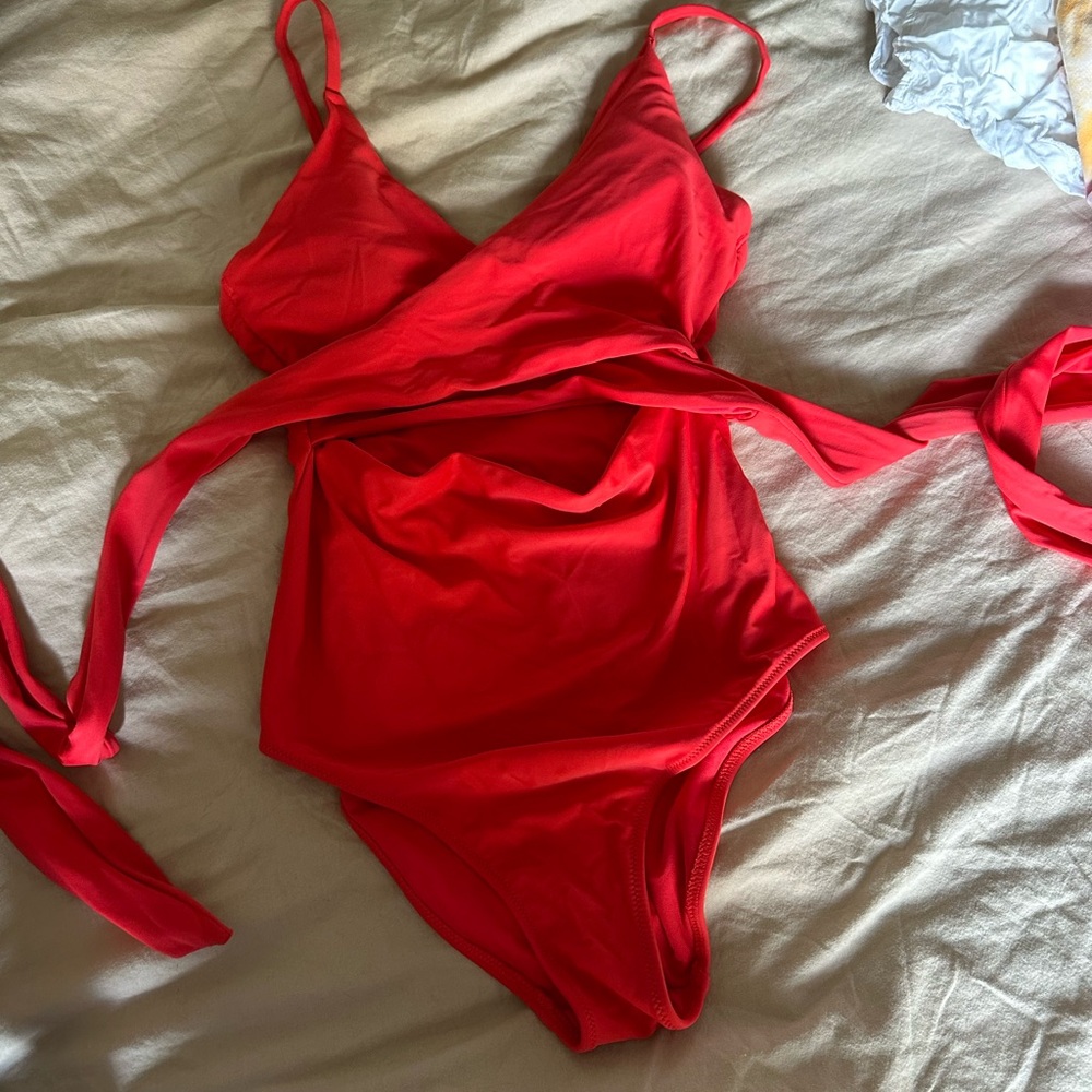 Red one piece with cutout